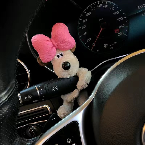 Peluche de Perro con Moño Verde para Auto 12 cm
